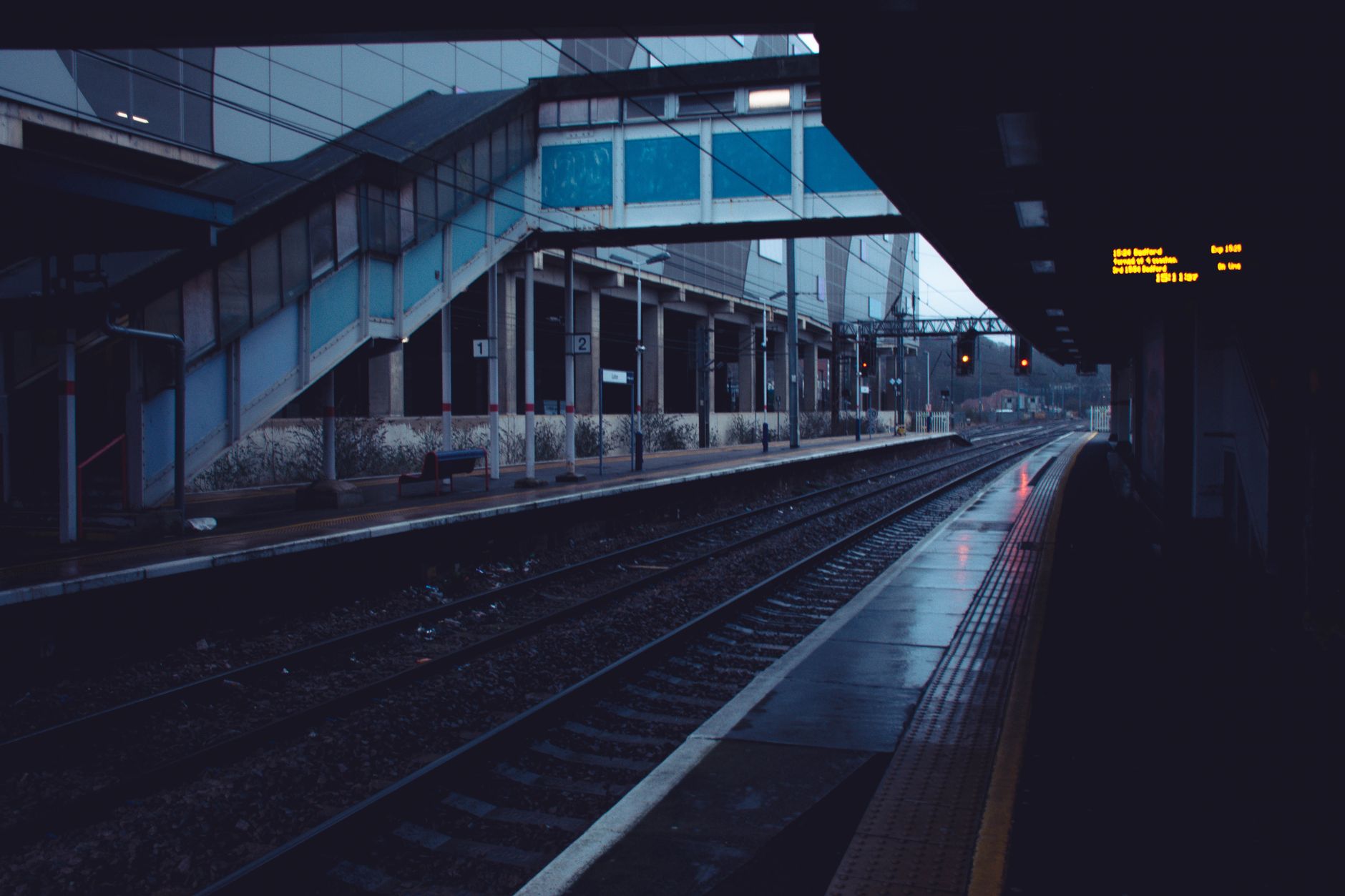 Passengers waiting at a British train station platform — Great British Railways 2026 takes over services nationwide
