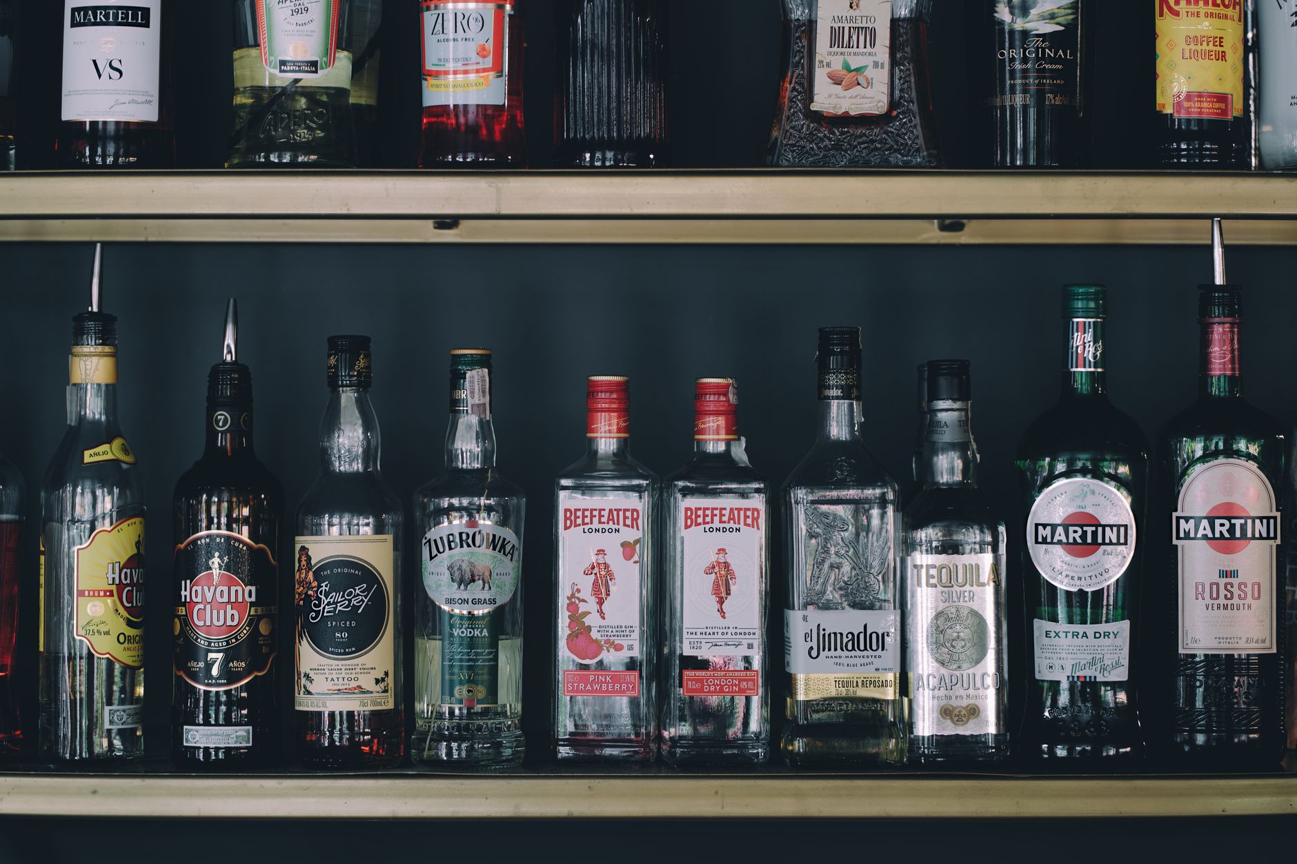 Supermarket shelf of non-alcoholic drinks reflecting UK alcohol consumption falling in 2026