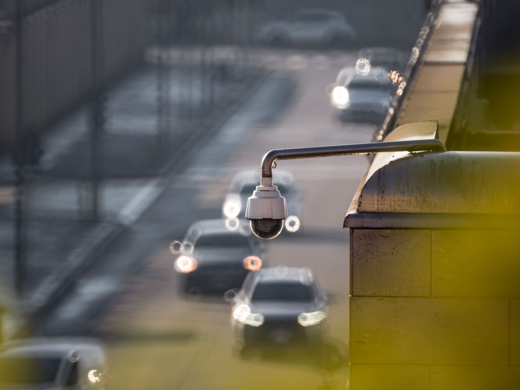 CCTV cameras overlooking a British high street illustrating facial recognition technology UK surveillance