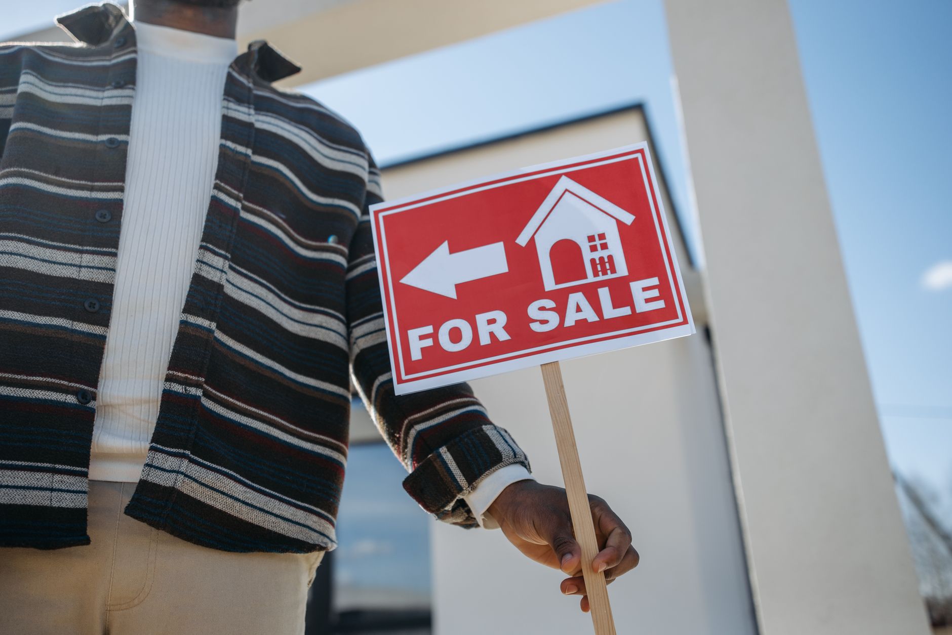 To Let sign outside a terraced house representing the private rental sector UK housing crisis